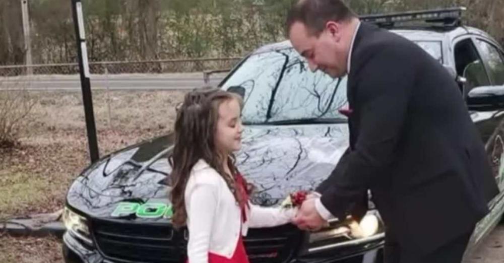 8-year-old wants to attend daddy-daughter dance after losing father - so kind officer takes her